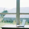 An open laptop on a desk where symptoms of generalized anxiety disorder in adults can make it difficult to concentrate.