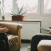 A therapist discusses anxiety treatment with a client in Fairfax, VA.