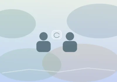 Two people discussing trauma therapy options in a calm counseling setting