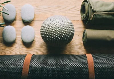 Yoga mats and massage tools for effective therapy techniques for stress management.
