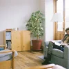 Two people in an LGBTQ-affirming therapy session discussing family rejection and relationship challenges.