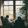 Adult speaking with a therapist in a calm office