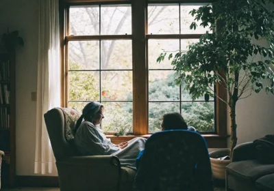 Adult speaking with a therapist in a calm office