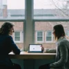 A therapist in Fairfax, VA, discusses Medicaid therapy options with a client.