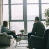 A person receiving help for PTSD recovery through trauma therapy.