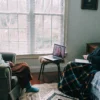 Client attending a calm telehealth therapy session from home