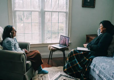 Client attending a calm telehealth therapy session from home