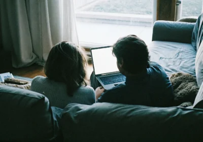 Couple preparing for a private online therapy session at home